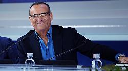 Carlo Conti ospite a Tv talk sabato 22 febraio su Rai 3 per rispondere alle domande sul Festival. Sui social: "Inviteresti Amadeus l'anno prossimo?"